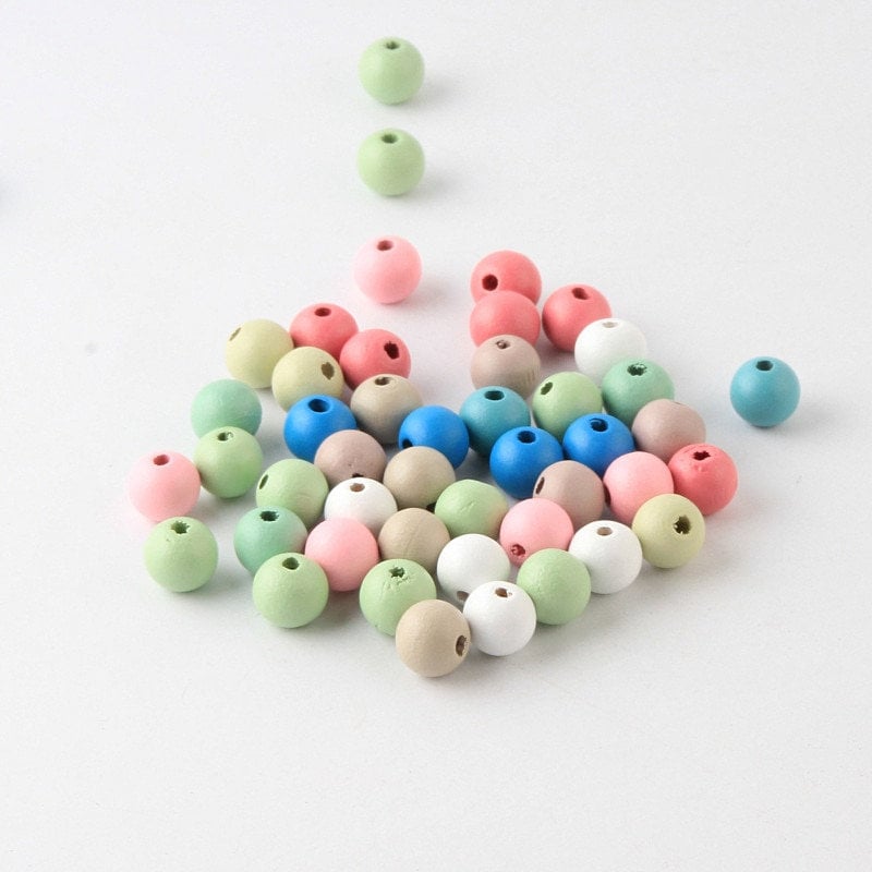 Holz-Kugeln, Bastel Perlen in Verschiedenen Pastellfarben Perlen Ketten Perlen Holz Bunt 10mm 50 Stück Set, sowie Löchern zum Auffädeln.